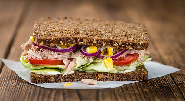 istock Fresh made Tuna sandwich with wholemeal bread (selective focus) 619067402