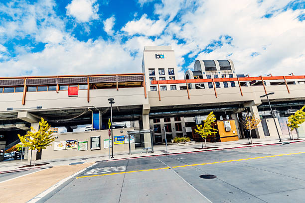 Walnut Creek, California, USA - October 15, 2016:  Exterior facade of the BART station at Pleasant Hill Contra Costa Centre Station at Coggins Drive, in the commuter town of Walnut Creek, California. The Bay Area Rapid Transport system is designed to alleviate the congestion on the crowded highways on the morning commute to work in the San Francisco area.