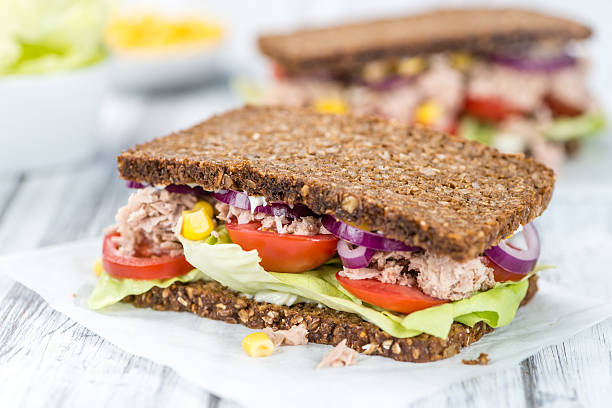 istock Fresh made Tuna sandwich with wholemeal bread (selective focus) 619068178
