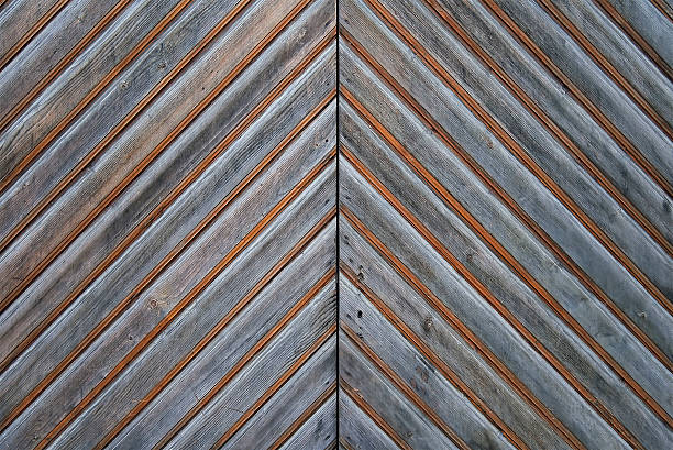 istock Old wooden door background texture 619071044