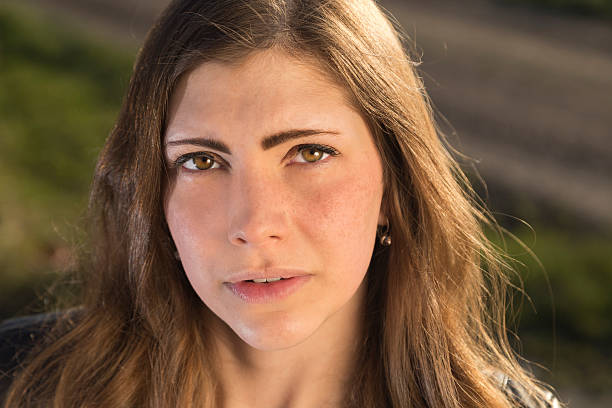 istock Beautiful young woman 619071574