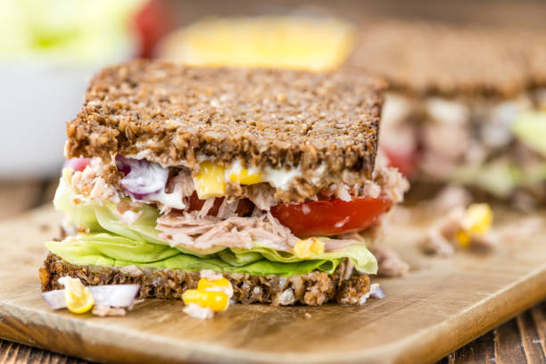 istock Fresh made Tuna sandwich with wholemeal bread (selective focus) 619071768