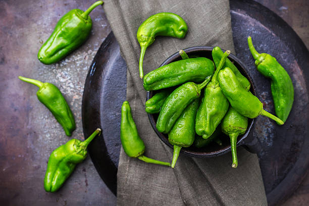 istock Raw green mexican spanish peppers jalapeno 619072612