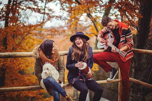 Smiling friends having fun in the park