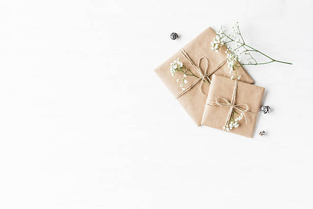 istock Christmas gift, pine cones and gypsophila flowers 619074198