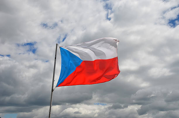istock czech republic national flag and cloudy sky 619074996