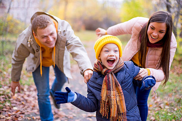 istock family playing catch-up 619077770