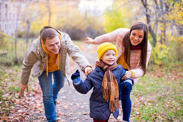 istock family playing catch-up 619077886