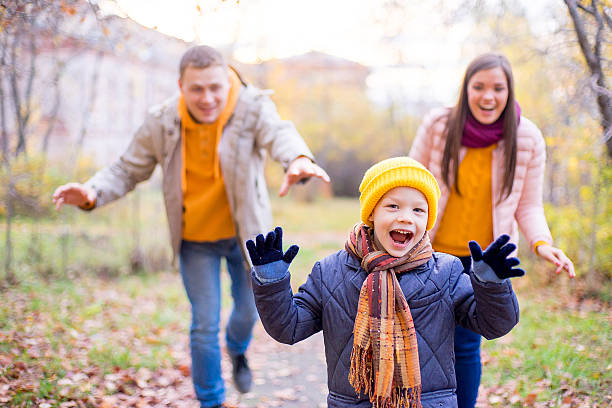 istock family playing catch-up 619078258