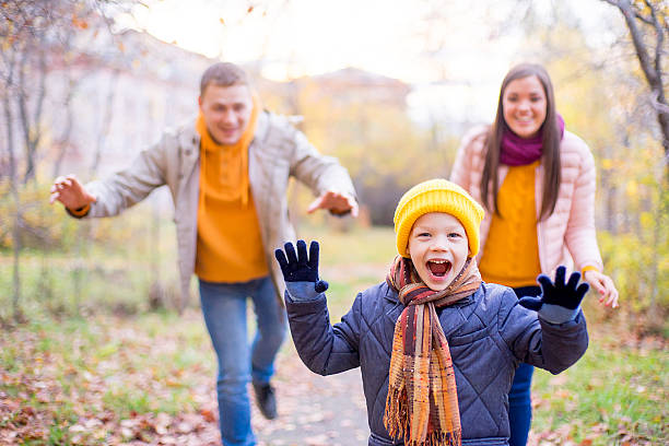 istock family playing catch-up 619078358