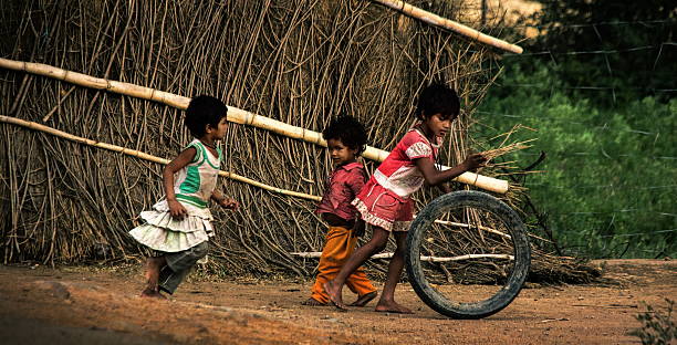 Rural Indian Child Playing Cricket