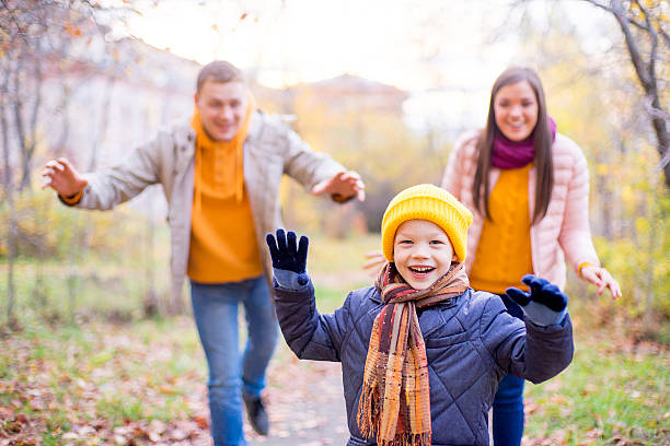 istock family playing catch-up 619078468