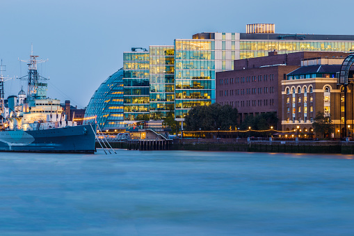 London cityscape including City Hall seen from river Thames