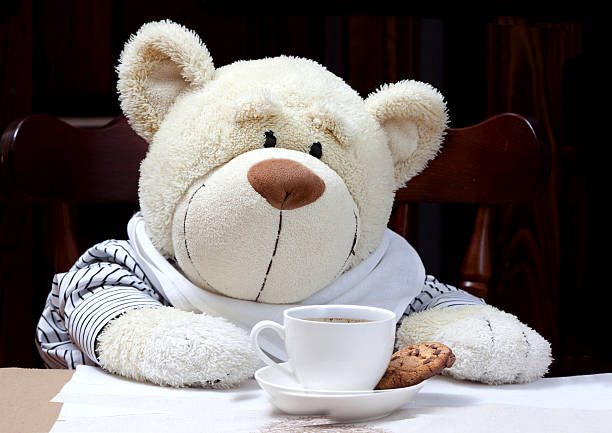 istock SweetTeddy Bear With Cup of Coffee 619084580