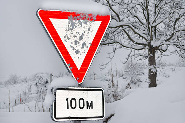 istock Covered with snow street sign 619085106
