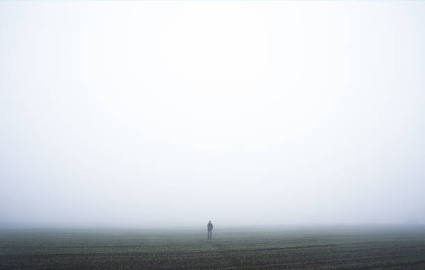 istock Lonely man in a fog 619085762