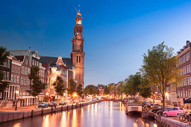istock Amsterdam canals in front of Westkerk and Anne Frank museum 619087190