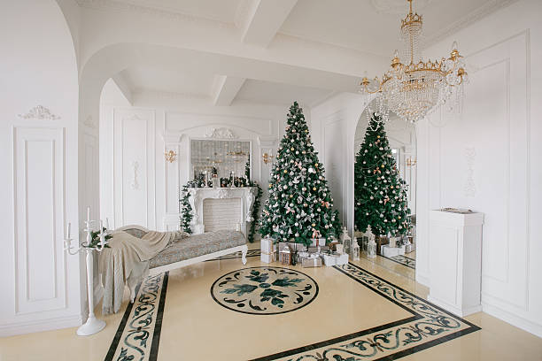 istock Christmas morning. classic luxury apartments with a white fireplace, decorated 619087794