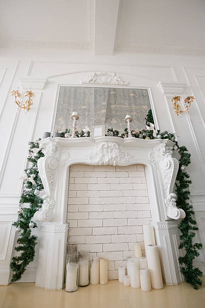 istock Christmas morning. classic luxury apartments with a white fireplace, decorated 619088064