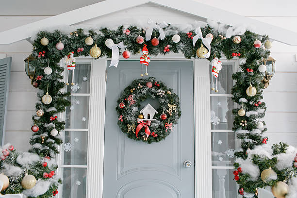 istock children's room. Green fir-tree with red and gold 619088094