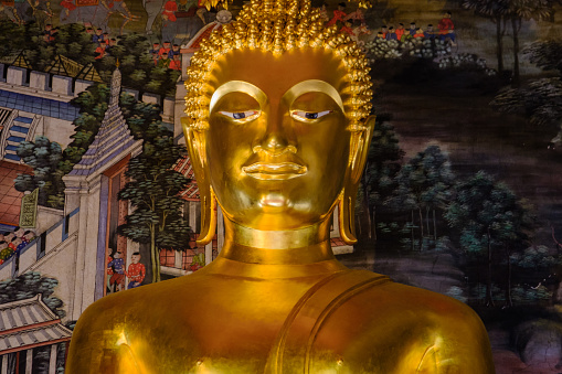 Beautiful of golden Buddha statue and thai art architecture in Wat Bovoranives, Bangkok, Thailand. Photo taken on: October 30, 2016