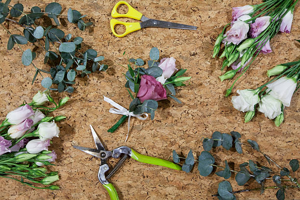 istock Boutonniere on the wooden background 619089272