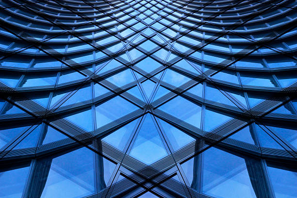 istock Contemporary glass architecture. Double exposure photo of glazed aluminum structures. 619089416