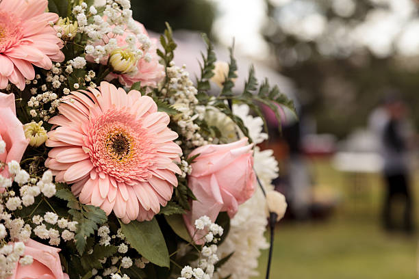 istock pink roses and pink gerbera daisies 619090970
