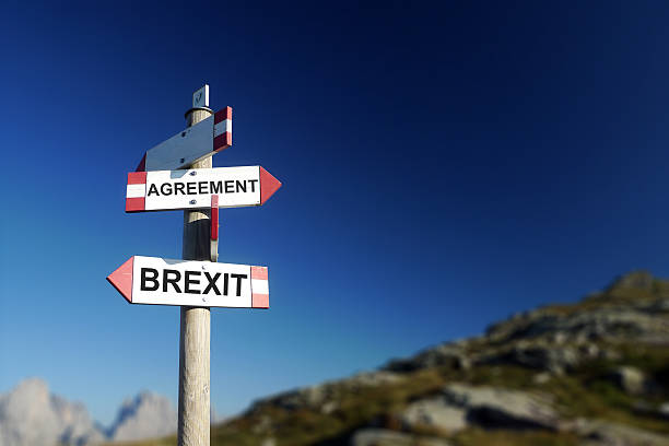 istock Brexit agreement written on road sign. 619091076