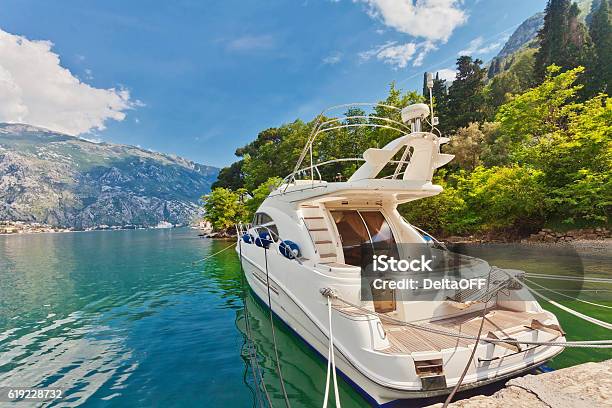 Speedboat Near The Pier Stock Photo - Download Image Now - Activity, Aquatic Sport, Engine