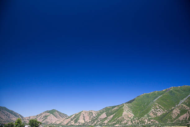 This is summer view of Deer Creek Reservoir and Heber Valley, Utah.  This shot was taken in Provo Canyon from an elevation of about 8500 ft.