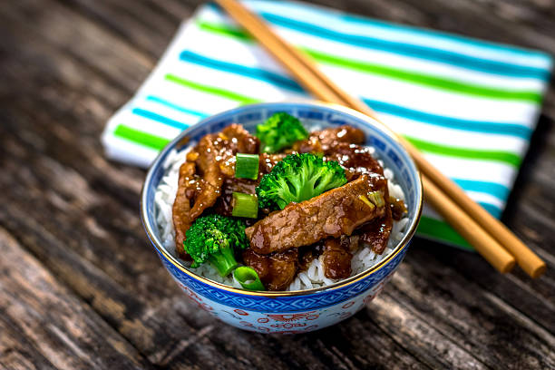 istock Beef in sauce with broccoli and rice 619231202