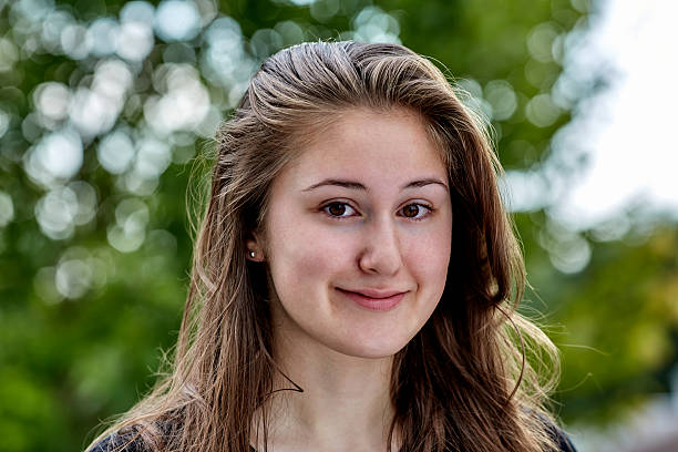 istock Contemplative Young Woman Smiling 619232144