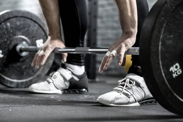 Workout with barbell stock photo