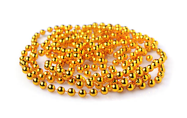 istock Golden Christmas beads 619243530