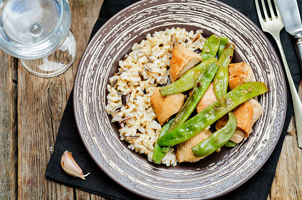 istock Balsamic chicken with green beans and brown rice 619244946