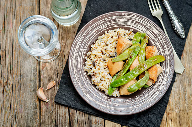 istock Balsamic chicken with green beans and brown rice 619244956