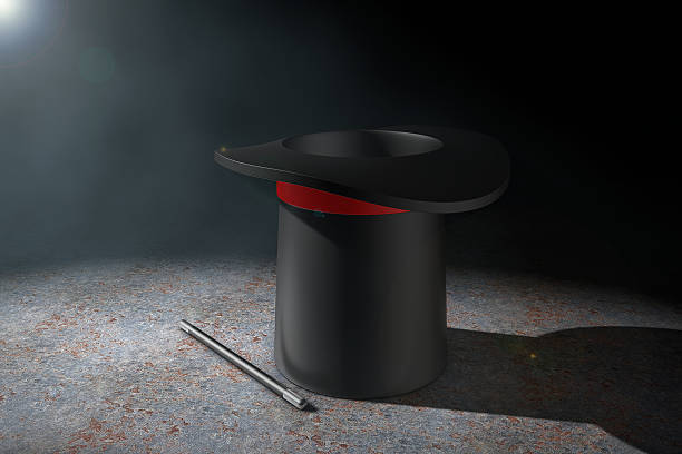 istock Magic Hat and Magic Wand in the volumetric light. 619247206