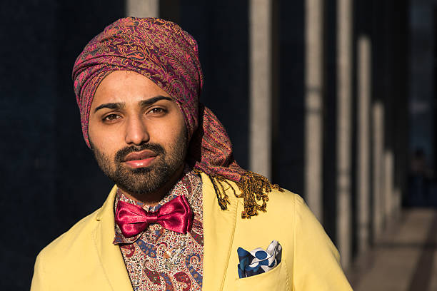 istock Indian handsome man posing in an urban context 619248760