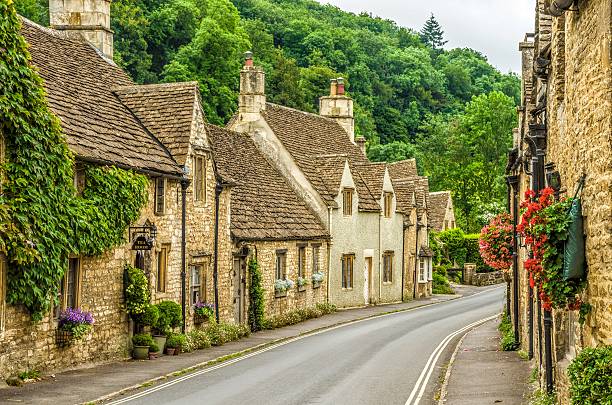 Village of Castle Combe Historic houses in Castle Combe, Wiltshire, described as the prettiest village in England. wiltshire stock pictures, royalty-free photos & images