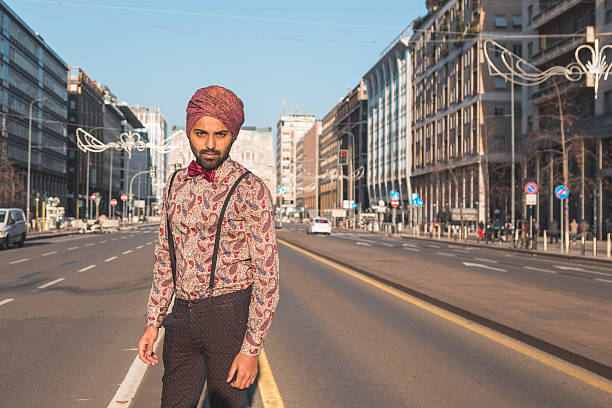istock Indian handsome man posing in an urban context 619249402