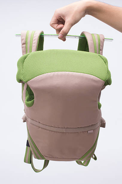 istock cute baby carrier a comfortable tool for mother 619249990