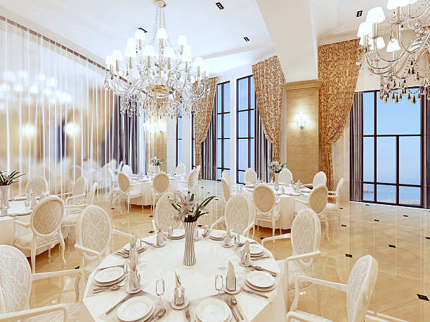 istock Luxurious ballroom, with white tables and large Windows. 619251146