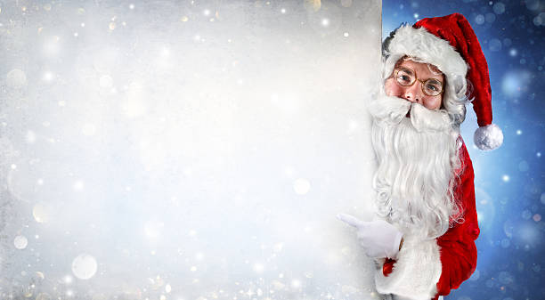 istock Santa Claus Holding Blank Banner 619251340
