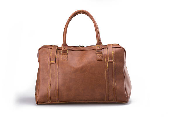 istock Brown Leather Woman Bag On White 619251606