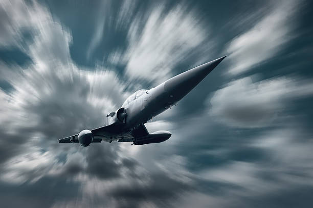 istock Military airplan on the speed in the sky 619252276