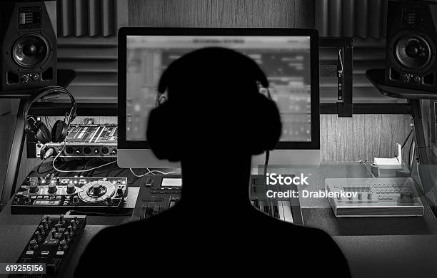 Man Produce Electronic Music In Studio Stock Photo - Download Image Now - Music, Recording Studio, Producer