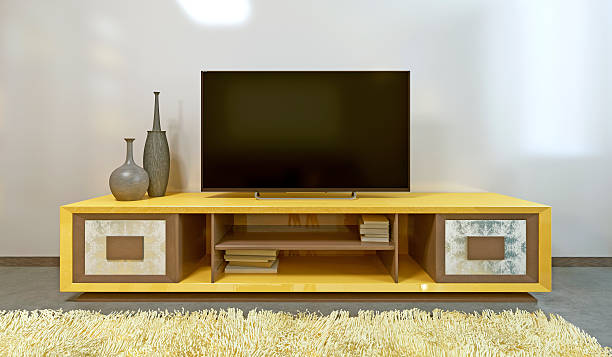 istock Bright yellow TV unit in modern living room. 619256686