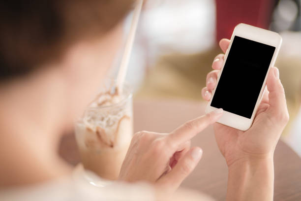 Woman Using smartphone. close-up.