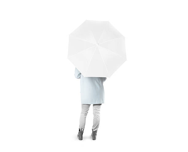 女性は白い空白の傘がモックアップを開いて後ろ向きに立つ - rain women umbrella parasol ストックフォトと画像